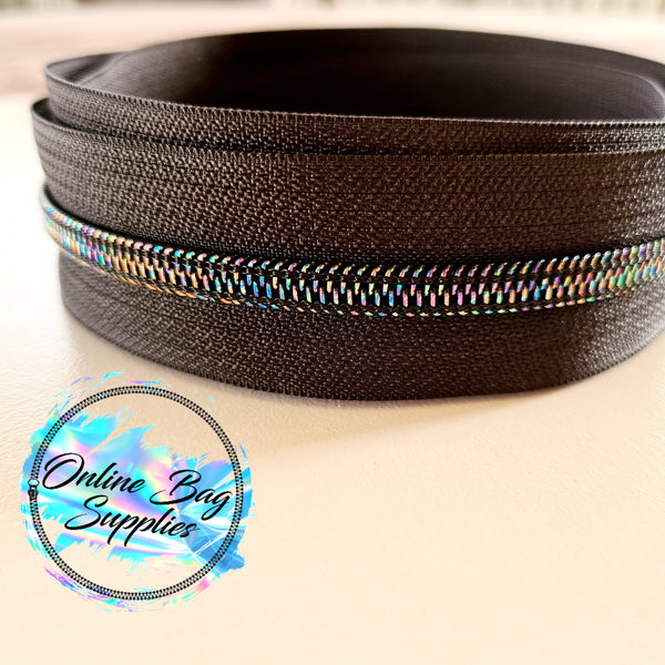 Iridescent with black number 5 zipper tape