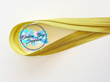 Gold on gold number 5 zipper tape