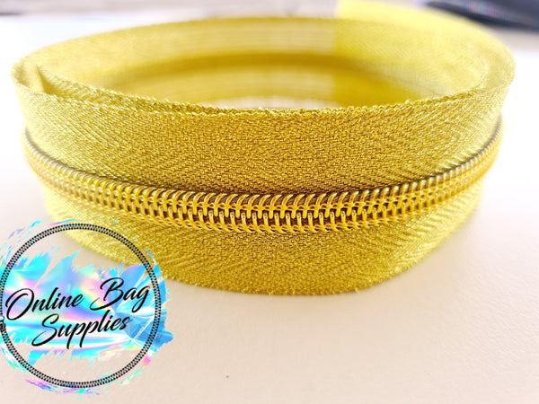 Gold on gold number 5 zipper tape