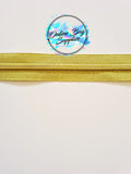 Gold on gold number 5 zipper tape
