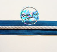 Silver with teal number 5 zipper tape