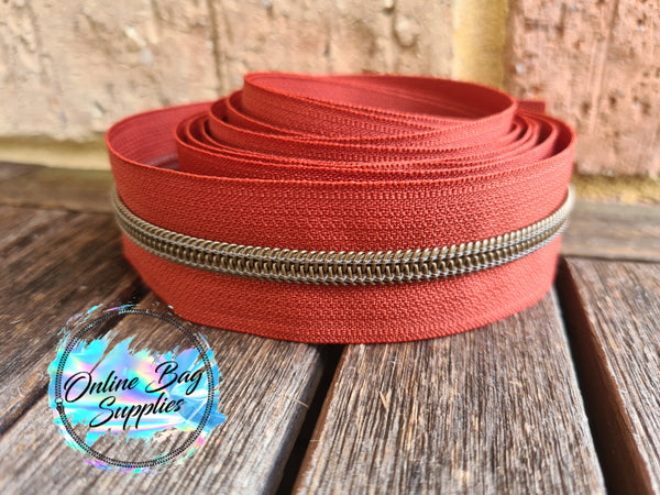 Antique Brass on Rust Number 5 Zipper Tape