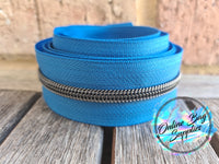 Gunmetal on Sky Blue